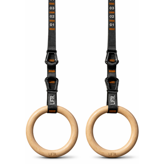 LIFTR 32mm wooden gymnastic rings with adjustable straps — natural wood finish